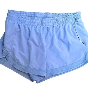 Athleta Mesh Racer Run Mid Rise Shorts in Light Blue. Size Large